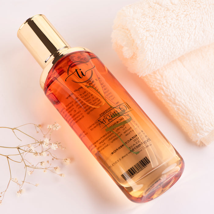 TIWASSI USA Argan oil for hair - 100% PURE Argan oil for strong and shiny hair - Extra penetrating renewing hair Oil Deep Moisturizing with vitamin E for healthy hair 100ml